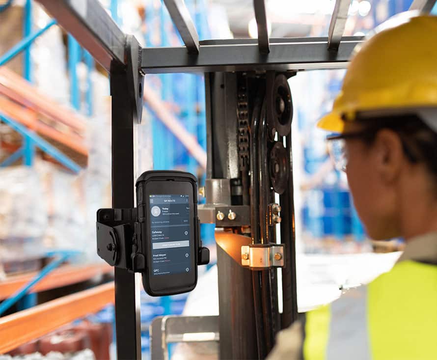 Forklift scanner holder with worker